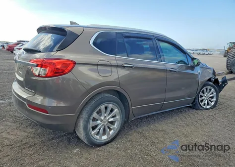 2018 Buick Envision Essence z USA, uszkodzony, nr VIN LRBFX1SA8JD007918